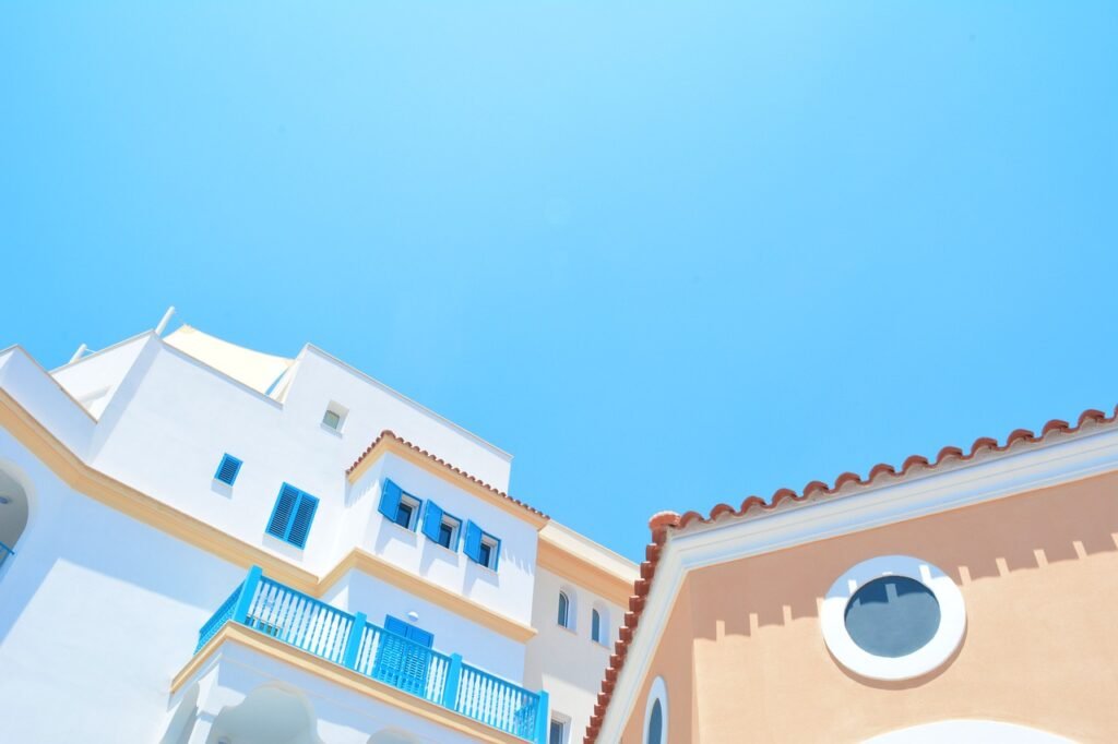 architecture, blue sky, buildings, city, contemporary, daylight, homes, houses, exteriors, house exteriors, outdoors, sky, nature, sunny