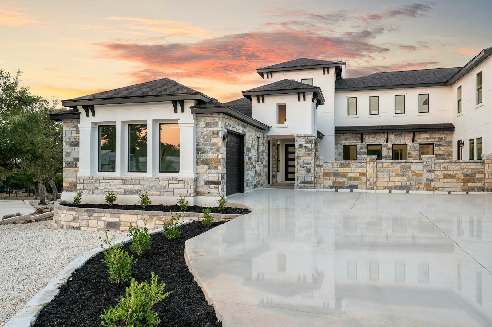 Modern luxury home exterior at dusk