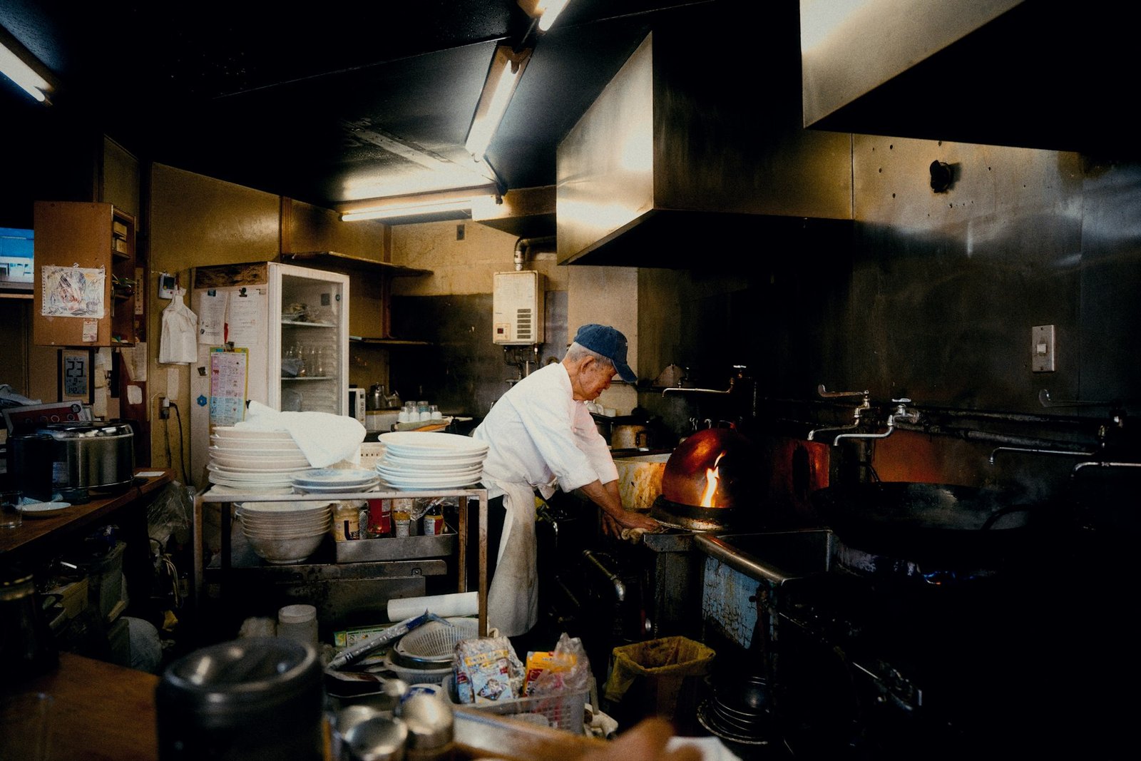 Chef working in a busy restaurant kitchen